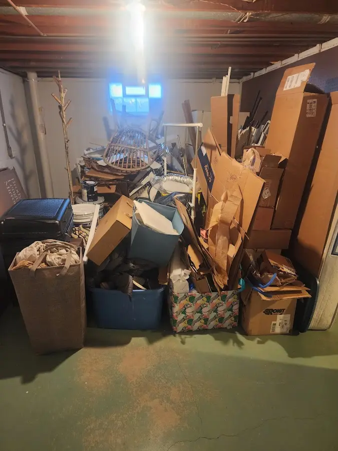 Roll-off dumpster container at job site for 4 Yard Dumpster Rental in Berea